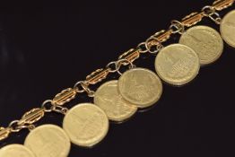 A 9ct gold bracelet with coins 19cm
