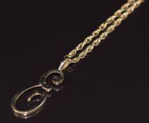 A 9ct gold letter E pendant, on 9ct gold chain, 5.2g