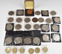 A collection of modern crowns including a cased gilt Coronation example, £5 coin, single metal £2