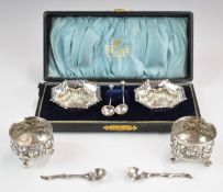 Two pairs of Victorian hallmarked silver open salts and spoons, one pair London 1895, maker Mappin &
