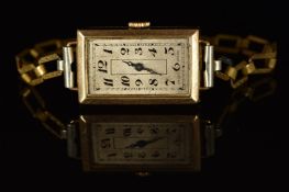 Art Deco 9ct gold ladies wristwatch with blued hands, Arabic numerals, silver dial and mechanical