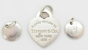 Three Tiffany & Co silver charms/ pendants