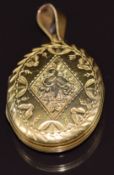 Victorian rolled gold locket with engraved decoration