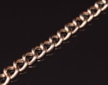 A 9ct rose gold curb link bracelet with heart padlock clasp, 11.5g 22cm