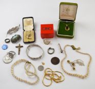 A 9ct gold pendant set with smoky quartz on a 9ct gold chain, silver bangle, silver ring, faux pearl