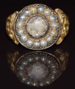 Victorian 18ct gold mourning ring set with plaited hair to a central locket surrounded by seed