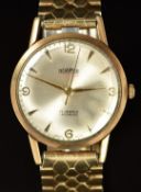 Roamer Premier 9ct gold gentleman's wristwatch with gold hands, Arabic numerals and hour markers,