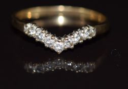 A 9ct gold V shaped ring set with diamonds, 1.3g, size N