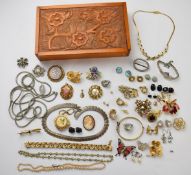 A collection of costume jewellery including silver necklace, vintage brooches, etc