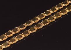 An 18ct gold necklace made up of knotted links with an oval panel, 42.6g