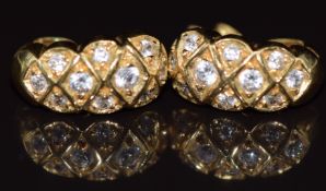 A pair of 18ct gold earrings set with cubic zirconia, 6.4g