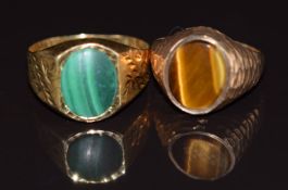 Two 9ct gold rings, one set with tiger's eye the other with malachite, 4.2g, size E & L