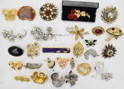 A collection of vintage brooches including Sphinx, paste, Exquisite, etc