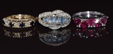 A 9ct gold ring set with sapphires and diamonds (2.4g, size L) and two silver rings