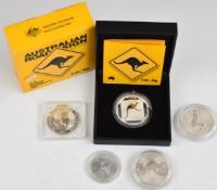 Five Australian 1oz silver coins including 2020 kangaroo, 2013 kangaroo road sign, kookaburra etc