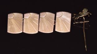 A pair of 9ct rose gold cufflinks with sunburst design, Birmingham 1934, and a 9ct gold stick pin,