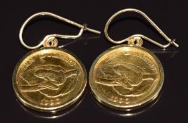 A pair of 14k gold earrings each set with a 1990 Bermuda 10 Dollar coin, 8.2g