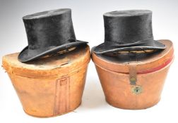 Two vintage top hats in leather cases, one Dunn & Co., London 19 x 15cm, the other marked 'superior'