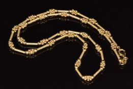 A 14k gold necklace made up of elongated links and sphere links, 12.8g, 45cm