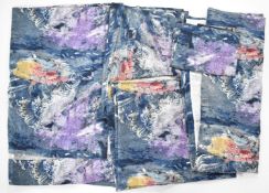 A number of curtains in the Glyders fabric by Sanderson, designed by the artist John Piper (1903-