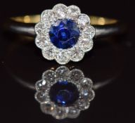 Art Deco 18ct gold ring set with a round cut sapphire surrounded by diamonds, 2.6g, size N