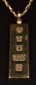 A 9ct gold ingot on 9ct gold chain, 19.9g