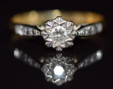 An 18ct gold ring set with a diamond in a platinum illusion setting, 2.4g, size M