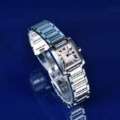 Cartier Tank Francaise wristwatch ref. 3217 with blued hands, black Roman numerals, silver dial,