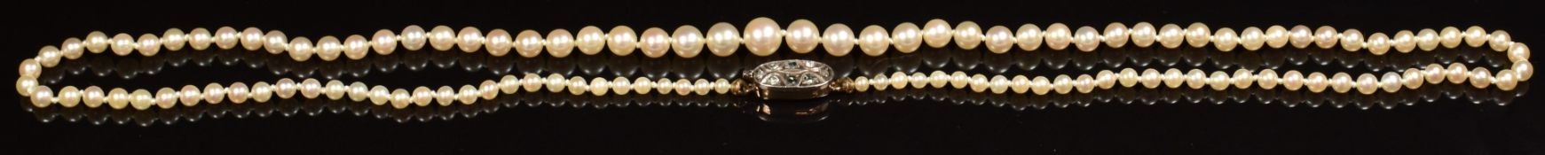 A single strand of pearls with 9ct gold clasp set with rose cut diamonds