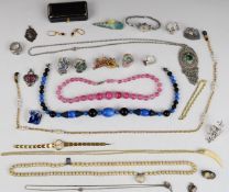 Seven silver rings, paste pendant, silver fob, quartz brooch, heart pendant etc