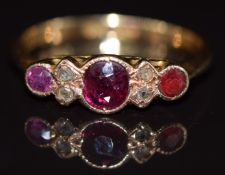 A c1930s 18ct gold ring set with rubies and rose cut diamonds, 2.3g, size L