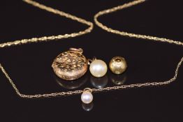 An 18k gold bead / pendant set with diamonds (1.4g), 9ct gold chain, two pearl pendants and