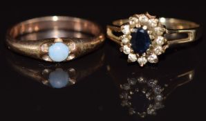 Two 9ct gold rings, one set with an opal and the other a sapphire, 3.3g, size K & L
