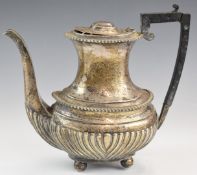 Victorian hallmarked silver hot water or coffee pot with reeded lower body, raised on four ball