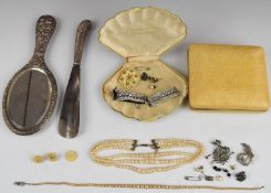 A silver mirror, silver shoehorn, faux pearls, silver and marcasite brooch and earrings etc