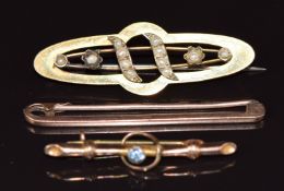 Edwardian 9ct gold brooch set with seed pearls, 9ct rose gold brooch and another 9ct gold brooch,