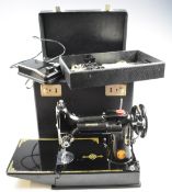 Singer 221K1 featherweight sewing machine, in original carry case with instructions, accessories,