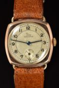 Record 9ct gold gentleman's wristwatch with subsidiary seconds dial, blued hands, Arabic numerals,
