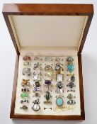 Forty four silver rings including pearl, amethyst, tiger's eye, peridot, rose quartz, etc
