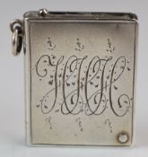 George V hallmarked silver novelty stamp case formed as a book, Birmingham 1914, maker Crisford &