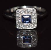 Art Deco 18ct white gold ring set with a square cut sapphire surrounded by diamonds in a platinum
