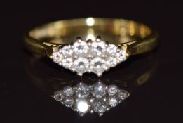 An 18ct gold ring set with diamonds, 2.5g, size M