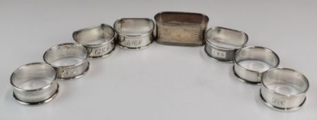 Eight Victorian and later hallmarked silver napkin rings including a pair, weight 118g