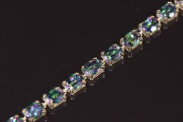 A 9ct gold bracelet set with oval cut mystic topaz, 13.2g 20cm