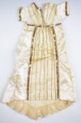 19thC cream silk and lace child's dress with sequinned and beaded decoration and lace trim to the