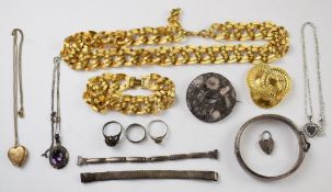 A collection of jewellery including silver bangle, silver watch straps, 9ct gold back and front