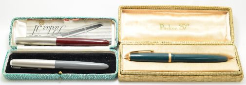 Three Parker 51 fountain pens, two in boxes
