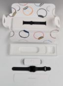 Series 6 Apple Watch, in original box with charging cable and paperwork.