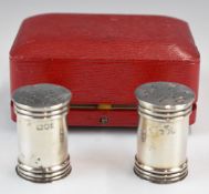 Cased pair of Victorian hallmarked silver peppers, London 1899, maker Horace Woodward & Co Ltd,