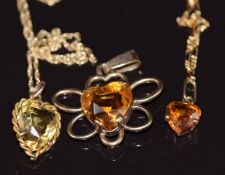 Three 9ct gold pendants set with heart cut citrines and two 9ct gold chains, 6.1g